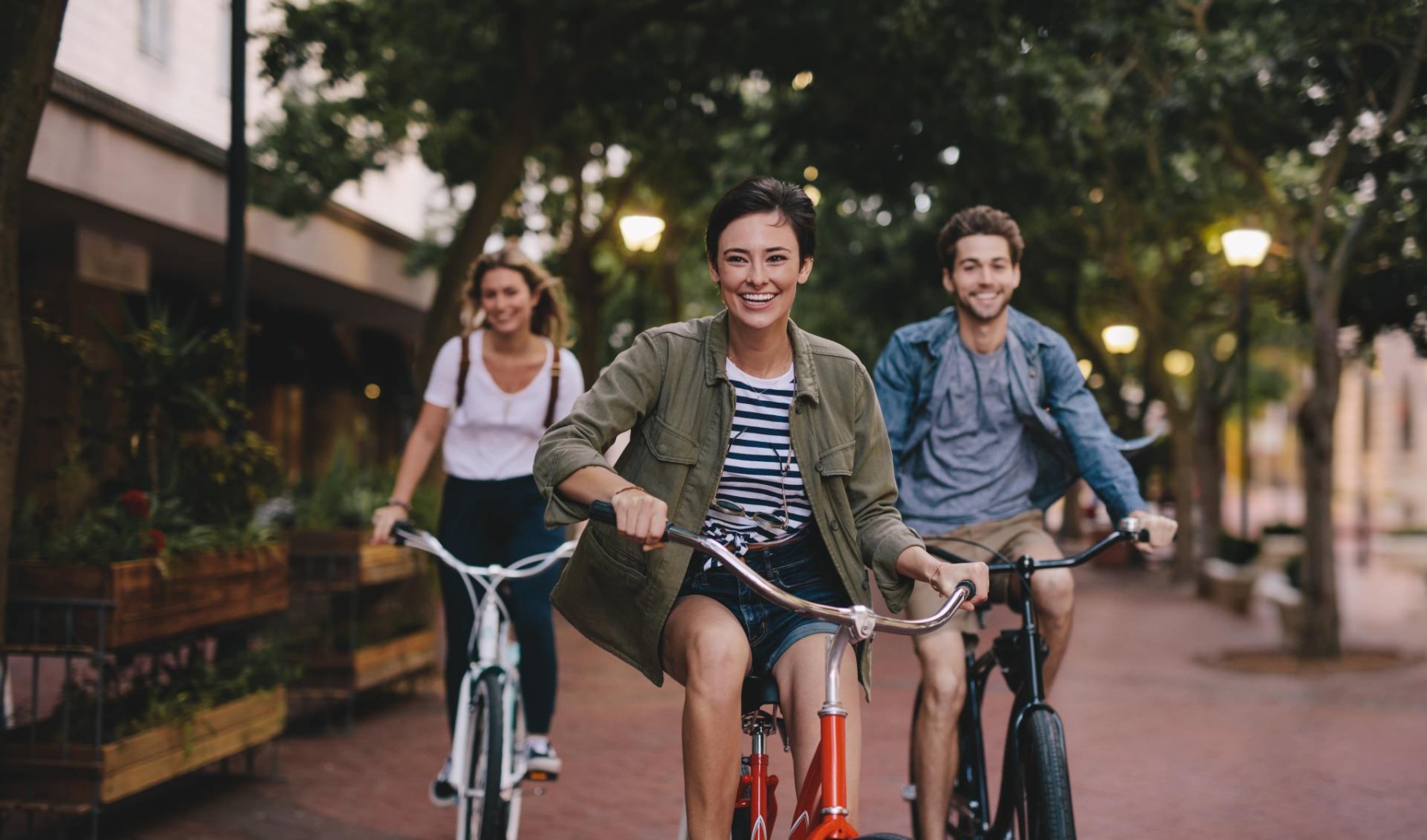 group of people riding bikes